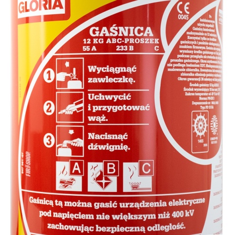 Zbliżenie na etykietę gaśnicy Gloria GP-12x ABC z klasami pożarów 55A 233B C i instrukcją użycia.
